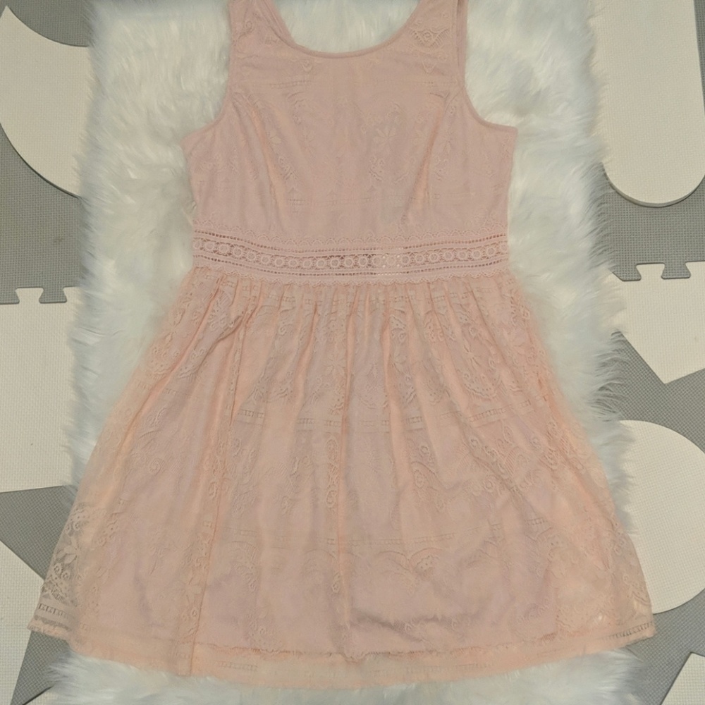 Blush lace dress with cutout waist